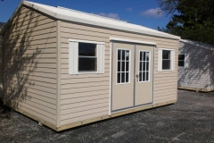 10x16 Beige and Cream w/FL Eave and Bahama Double Door